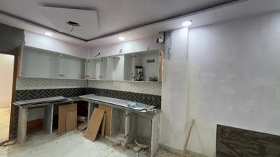 Kitchen Image of 1040 Sq.ft 3 BHK Apartment / Flat for sale in Sector 5 Rohini New Delhi for Rs. 6700000