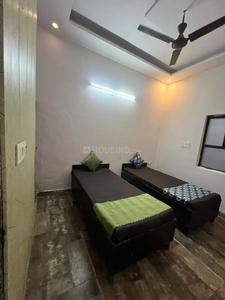 Bedroom Image of RR PG Coliving sec -27 noida in Sector 27, Noida