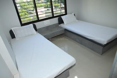 Bedroom Image of Radhesh PG for Boys in Satellite, Ahmedabad