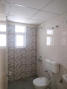 Common Bathroom One Image of 1446 Sq.ft 4 BHK Apartment / Flat for sale in Advitya Homes, Kail Gaon Faridabad for Rs. 10300000