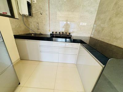 Kitchen Image of 600 Sq.ft 1 BHK Apartment / Flat for rent in Paranjape Blueridge The Groves, Hinjawadi Pune for Rs. 28000