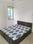 Shanta Laxman Apartment Bedroom 1