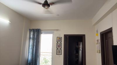Living Room Image of 584 Sq.ft 1 BHK Apartment / Flat for rent in Aditya Urban Homes Phase 1C, Bamheta Village Ghaziabad for Rs. 17000