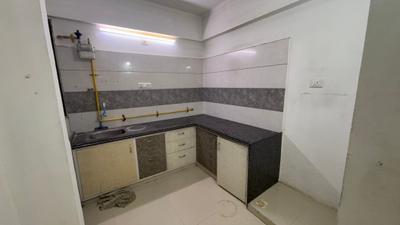 Kitchen Image of 1200 Sq.ft 2 BHK Apartment / Flat for sale in Aaryan Gloria, South Bopal Ahmedabad for Rs. 5800000