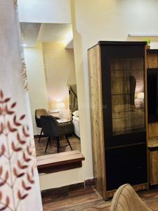 Bedroom Image of 400 Sq.ft 1 BHK Studio for rent in DLF Capital Greens Phase 1 And 2, Karampura New Delhi for Rs. 25000