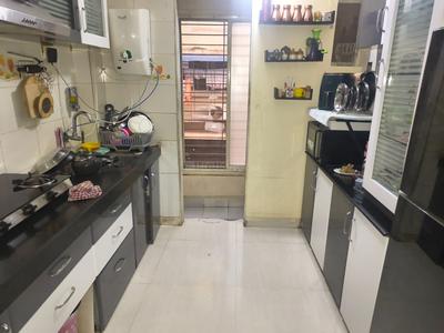 Kitchen Image of 1000 Sq.ft 2 BHK Apartment / Flat for sale in Boisar Mumbai for Rs. 4000000