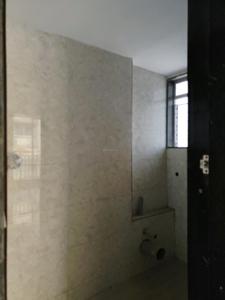 Common Bathroom Image of 601 Sq.ft 2 BHK Apartment / Flat for sale in Mansarovar Pearl Gardens, Vasai West Vasai for Rs. 6300000