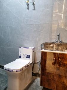 Common Bathroom Three Image of 1000 Sq.ft 3 BHK Apartment / Flat for sale in Hans Builders Floor, Nawada New Delhi for Rs. 5900000