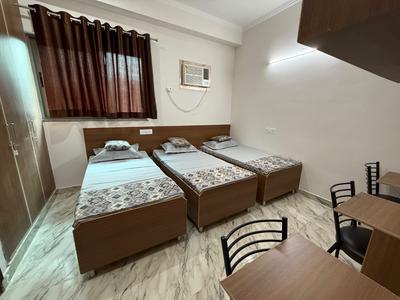 Bedroom Image of Vizima Boys PG in Sector 128, Noida