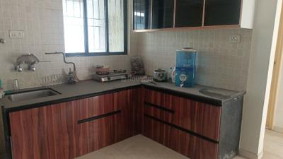 Kitchen Image of 1000 Sq.ft 2 BHK Apartment / Flat for rent in Achalare 52 Green Woods, Sus Pune for Rs. 32000