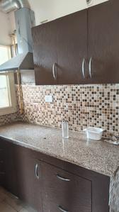 Kitchen Image of 1250 Sq.ft 3 BHK Apartment / Flat for rent in AWHO Vay Sector 8B G, Vrindavan Yojana Lucknow for Rs. 22000