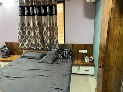 Bedroom Image of 1565 Sq.ft 3 BHK Apartment / Flat for sale in Raghuvir Saffron, Bhimrad Surat for Rs. 8000000
