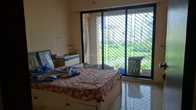 Bedroom Image of 1120 Sq.ft 2 BHK Apartment / Flat for rent in Tharwani Riviera, Kharghar Navi Mumbai for Rs. 34500