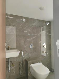 Common Bathroom Image of 587 Sq.ft 1 BHK Apartment / Flat for sale in Sai Paradise Avenue, Saphale Mumbai for Rs. 1827000
