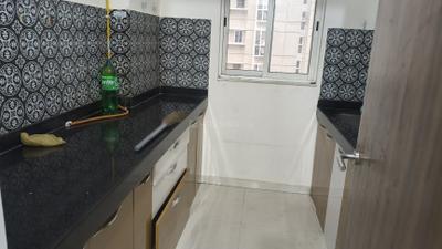 Kitchen Image of 590 Sq.ft 1 BHK Apartment / Flat for rent in Lodha Amara, Kolshet Thane for Rs. 27000