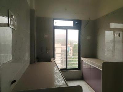 Kitchen Image of 650 Sq.ft 1 BHK Apartment / Flat for sale in Madhav Vatika, Palghar Mumbai for Rs. 2600001