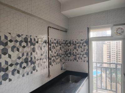 Kitchen Image of 450 Sq.ft 1 BHK Apartment / Flat for rent in Puranik City Phase 3, Kasarvadavali Thane for Rs. 16358