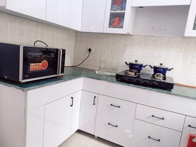 Kitchen Image of 1436 Sq.ft 3 BHK Apartment / Flat for sale in Gulshan Vivante, Sector 137 Noida for Rs. 23000000