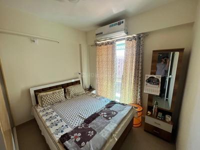 Bedroom Image of 850 Sq.ft 1 BHK Apartment / Flat for rent in Applewoods Satyesh Residency, Shela Ahmedabad for Rs. 19000