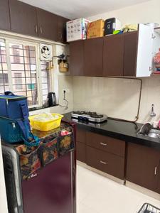 Kitchen Image of 650 Sq.ft 1 BHK Apartment / Flat for rent in Regalia Apartment, Wakad Pune for Rs. 23000
