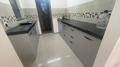 Kitchen Image of 920 Sq.ft 2 BHK Apartment / Flat for rent in Mahindra Happinest Tathawade, Tathawade Pune for Rs. 25000