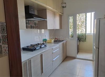 Kitchen Image of 950 Sq.ft 1 BHK Apartment / Flat for rent in Bhartiya Nikoo Homes Phase 2, Thanisandra Bengaluru for Rs. 40000