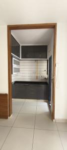 Kitchen Image of 590 Sq.ft 2 BHK Apartment / Flat for rent in Madhapar Rajkot for Rs. 9000