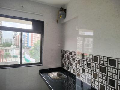 Kitchen Image of 740 Sq.ft 1 BHK Apartment / Flat for rent in Unnati Woods Phase 7, Kasarvadavali Thane for Rs. 16500