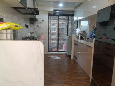 Kitchen Image of 1000 Sq.ft 2 BHK Apartment / Flat for sale in Royal Palms Garden View, Goregaon East Mumbai for Rs. 10800000