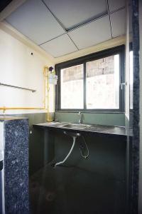 Kitchen Image of 1080 Sq.ft 2 BHK Apartment / Flat for sale in Sunbuildcon Suryansh Sanidhya Shivalaya, Sarkhej Ahmedabad for Rs. 5200000