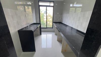 Kitchen Image of 780 Sq.ft 2 BHK Apartment / Flat for sale in Rishabraj Forest Front, Borivali East Mumbai for Rs. 17100000