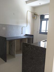 Kitchen Image of 595 Sq.ft 2 BHK Apartment / Flat for sale in Kalptaru Srishti Namah, Mira Road East Mira Bhayandar for Rs. 13500000