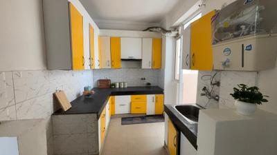 Kitchen Image of 1410 Sq.ft 3 BHK Apartment / Flat for sale in Galaxy North Avenue, Noida Extension Greater Noida for Rs. 12700000