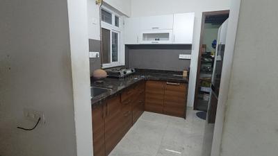 Kitchen Image of 956 Sq.ft 2 BHK Apartment / Flat for rent in Chandrarang Basileo, Pimple Gurav Pune for Rs. 32000