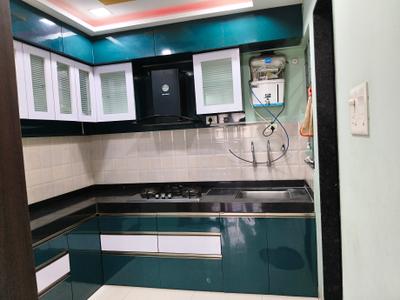 Kitchen Image of 1050 Sq.ft 2 BHK Apartment / Flat for rent in Yashada Splendid Courtyard, Lohegaon Pune for Rs. 30000