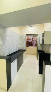 Kitchen Image of 1020 Sq.ft 2 BHK Apartment / Flat for sale in Mohan Precious Greens, Ambernath East Ambernath for Rs. 4575000