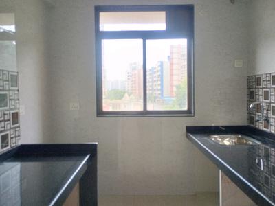 Kitchen Image of 715 Sq.ft 1 BHK Apartment / Flat for sale in Rkr Precious Empire Wing A B And C, Ambernath East Ambernath for Rs. 2500000