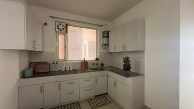 Kitchen Image of 704 Sq.ft 2 BHK Apartment / Flat for sale in Pyramid Urban Homes II, Sector 86 Gurgaon for Rs. 7000000