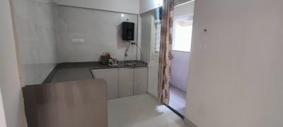 Kitchen Image of 860 Sq.ft 2 BHK Apartment / Flat for rent in Wadhwani Om Manglam Chaitanya, Kiwale Pune for Rs. 21000