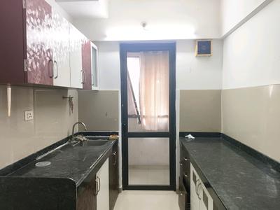 Kitchen Image of 720 Sq.ft 1 BHK Apartment / Flat for rent in Lodha Lakeshore Greens, Palava Phase 2 Thane for Rs. 15000