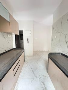 Kitchen Image of 680 Sq.ft 2 BHK Apartment / Flat for sale in Rishabraj Saffron Peace, Borivali West Mumbai for Rs. 18500000
