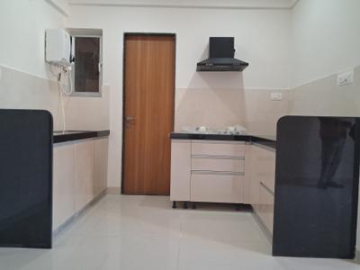 Kitchen Image of 950 Sq.ft 2 BHK Apartment / Flat for rent in Gera Planet Of Joy IV, Upper Kharadi Pune for Rs. 35000