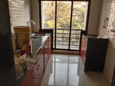 Kitchen Image of 600 Sq.ft 1 BHK Apartment / Flat for sale in Mandakini Residency, Titwala Thane for Rs. 1800000