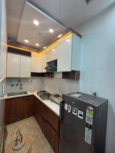 Kitchen Image of 548 Sq.ft 2 BHK Builder Floor for rent in Dwarka Mor New Delhi for Rs. 19000