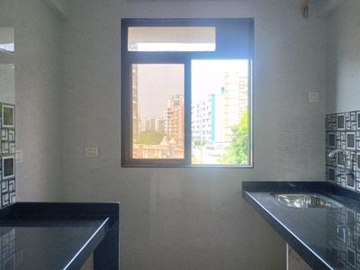 Kitchen Image of 600 Sq.ft 1 BHK Apartment / Flat for sale in MS Vrindavan City Building A And B, Ambivli Thane for Rs. 2999000