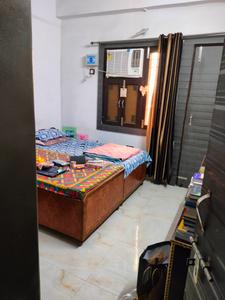 Bedroom Image of Mishra PG in Sewa Nagar, Ghaziabad