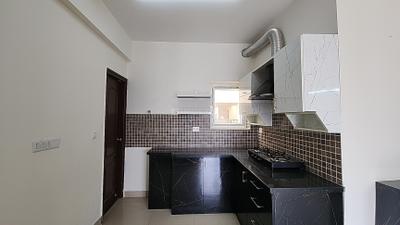 Kitchen Image of 974 Sq.ft 2 BHK Apartment / Flat for sale in SJR Parkway Homes, Rayasandra Bengaluru for Rs. 9700000