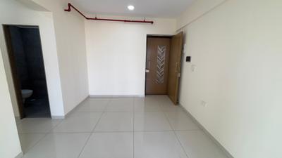 Living Room Image of 630 Sq.ft 1 BHK Apartment / Flat for sale in Godrej Nest, Kandivali East Mumbai for Rs. 11900000