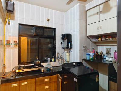 Kitchen Image of 933 Sq.ft 2 BHK Apartment / Flat for sale in Kasarvadavali Thane for Rs. 9800000