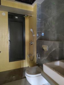 Common Bathroom Image of 877 Sq.ft 2 BHK Apartment / Flat for sale in Sardar Inspire Residency, Andheri East Mumbai for Rs. 17500000